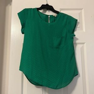 Green polka dot blouse
